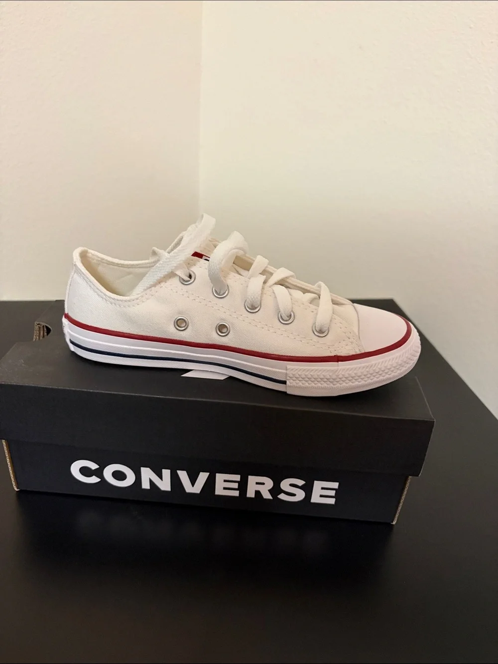 Converse Kids Low Top Sneakers in White and Red Trim